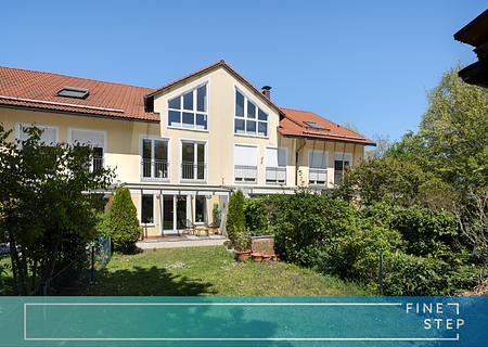 Ein familienfreundliches Haus mit außergewöhnlichem Grünblick, Garten und 2 TG-Plätze - nahe München - FINESTEP Immobilien
