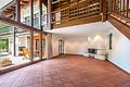 Helles Architektenhaus mit Südgarten in ruhiger Lage - Wohnzimmer mit Galerie