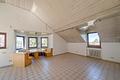 Exklusives Wohnambiente in Neuenbürg – Helle 3-Zimmer-Dachgeschosswohnung mit Balkon & Wellnessbad - Wohnzimmer