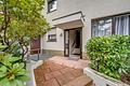 Attraktive 2-Zimmer-Eigentumswohnung mit Balkon und eigener Garage - Hauseingang