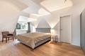 Neuwertige, klimatisierte 3-Zimmer-Dachgeschoss-Wohnung mit Liftzugang und Penthouse-Flair - Geräumiges Masterschlafzimmer