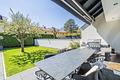 Exklusive Doppelhaushälfte mit sonnigem Südwest-Garten in Forstenried - Sonniger Garten mit großem Tisch