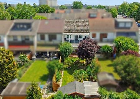 ++Familienglück mit großem Garten – Charmantes Reihenmittelhaus mit Terrasse in Raunheim++ - Titelbild