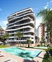 Appartements mit 2 Schlafzimmern, 2 Bädern, Tiefgaragenstellplatz, Gemeinschaftspool und schönem Ausblick nur 1.200 m vom Jachthafen und Strand