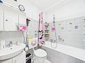 Solide Kapitalanlage mit Perspektive: Moderne 3-Zimmer-Wohnung in Germering - Badezimmer