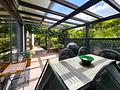 Provisionsfrei! Exklusives Einfamilienhaus mit stilvollem Design und idyllischem Garten - Großzügige Südterrasse mit Pergola