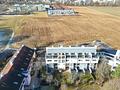 zur Kapitalanlage: Schöne Maisonette-Dachterrassenwohnung mit großem Ostbalkon in Taufkirchen - Luftbild 