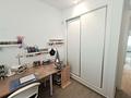 Moderne Erdgeschoss-Wohnung mit 3 Schlafzimmern, 2 Bädern, privatem Garten und Gemeinschaftspool