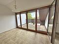 Bezugsfrei: Dachgeschosswohnung mit 2 herrlichen Dachterrassen in Taufkirchen - Wohnzimmer