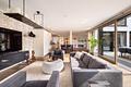 Moderne Architektenvilla mit exklusivem Interior-Konzept, Lift, Spa-Lounge, Home-Gym und Outdoorpool - Gemütlicher Loungebereich