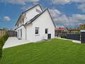 kurzfristig bezugsfertig: Schöne Neubau-Doppelhaushälfte mit großem Souterrainbereich - Gartenansicht Haus 2