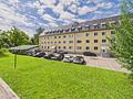 Charmante Dachgeschosswohnung mit Bergblick und überdachter Loggia
- begehrte, zentrale Wohnlage - Außenansicht