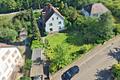 Viel Platz zum Leben: Einfamilienhaus in Premiumlage - Straßenansicht