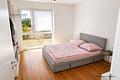 Neuwertige und offen gestaltete 2-Zimmer-EG-Wohnung mit schöner Terrasse - Schlafzimmer