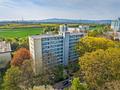 ++Attraktive Kapitalanlage: Vermietete Wohnung in Niederursel++ - Luftaufnahme Mehrfamilienhaus - Straßenseite