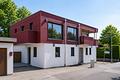 Stadtvilla mit kleinem Garten - Neubau Massivholzhaus am Waldrand mit 180m² Wohnfläche - Größere Einheit noch verfügbar