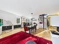 Schöne Maisonette-Dachgeschosswohnung in einem kleinen Mehrfamilienhaus mit nur 6 Einheiten in Solln - Wohnbereich 