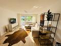 3-Zimmer-Wohnung in Schwabing-West – saniert, möbliert vermietet, mit TG-Stellplatz - Wohnbereich