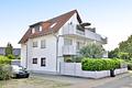 Attraktive Kapitalanlage: Vermietete 2-Zimmer-Wohnung mit Dachterrasse und 2 Stellplätzen - Hausansicht