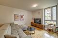 Neuwertige 2-Zimmer-Erdgeschosswohnung mit Terrasse, Garten und Stellplatz in Hockenheim - Wohnzimmer