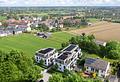 Neubauprojekt ROOTS in Bogenhausen / Johanneskirchen: Helle 1-Zimmer Wohnung mit Terrasse und Garten - Luftansicht 
