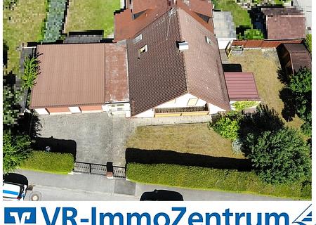 Baugrundstück mit bestehender Doppelhaushälfte in Ortsrandlage - Titelbild 