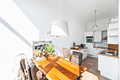 HEGERICH: Moderne Dachgeschosswohnung mit Loftcharakter und großer Sonnenterrasse in Fürth - Essbereich