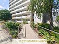 Wohnen im Münchner Süden: Gepflegtes 1-Zi.-Apartment mit sonnigem Südost-Balkon - Hauseingang