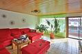 Modernisierte 3-Zi.-Wohnung mit Balkon in Freiburg-St. Nikolaus – langfristig vermietet und saniert - Wohnzimmer mit Balkon