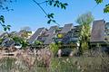 Kapitalanlage - Haus in Haus mit Garage und 3 Terrassen in attraktiver Lage von Bonn-Heiderhof - Rückansicht - Seeseite