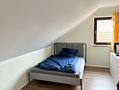 HEGERICH: Attraktive 3-Zimmer-Dachgeschosswohnung mit Terrasse in Oberasbach - Schlafzimmer 2