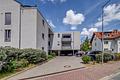 Neuwertige 2-Zimmer-Erdgeschosswohnung mit Terrasse, Garten und Stellplatz in Hockenheim - Vorderansicht