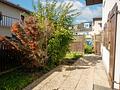 Charmante 2-Zimmer-Erdgeschosswohnung mit sonniger Terrasse, Garten & 2 Stellplätzen in Hofham - Terrasse