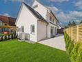 kurzfristig bezugsfertig: Schöne Neubau-Doppelhaushälfte mit großem Souterrainbereich - Gartenansicht Haus 1