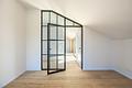 Erstbezug: Sehr charmante, großzügige 2-Zimmer-Wohnung mit sonniger Dachterrasse und Bergblick - Schlafzimmer mit modernem Glaselement