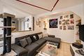 Attraktive Kapitalanlage: Vermietete Maisonette-Wohnung mit Balkon in saniertem Wohnhaus - Wohnzimmer