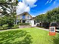 Traumhaftes Einfamilienhaus mit idyllischem Architektengarten - Gartenansicht