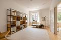 Großzügigkeit im Herzen Schwabings: Stilvoller Altbau mit 6 Zimmern und ruhigem Innenhof-Balkon - Eleganter Wohnbereich
