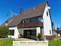 Großzügiges Familienhaus mit vielseitigen Möglichkeiten in ruhiger Lage von Lohhof - Hausansicht