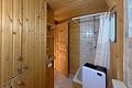 Charmantes Blockhaus in Spiegelberg: Auszeit, Weitblick und Natur pur auf großem Grundstück erleben! - Badezimmer UG