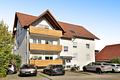 Gepflegte 2-Zimmer-Wohnung mit Balkon in Hatzenbühl – vermietet und ideal für Kapitalanleger - Hausansicht