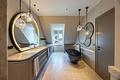 Penthouse der Spitzenklasse: Exquisites Interieur, Großzügigkeit und Privatsphäre - Masterbad mit freistehender Wanne