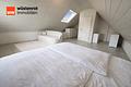 Großzügiges Raumangebot und attraktiver Wellnessbereich - DG Schlafzimmer Studio AI Staging
