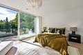 Lichterfülltes Bauhaus-Domizil mit Einliegerwohnung, Lift und sonnigem Traumgarten - Master-Bedroom mit Ankleide