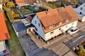 Familientraum in ruhiger Lage: Doppelhaushälfte mit Sonnengarten & Garage - renovierungsbedürftig - Titelbild