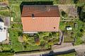 Stilvolles Einfamilienhaus mit großem Entwicklungspotenzial und Doppelgarage in sonniger Hanglage - Haus Außenansicht