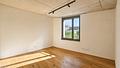 Designstarke Wohnung mit großem Balkon und maßgefertigter Einbauküche - Helles Schlafzimmer