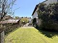 Reiheneckhaus mit großen sonnigen Grundstück in Feldkirchen-Westerham, Sofort bezugsfrei - Zugang zum Garten und Grundstück