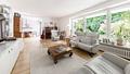Elegantes Einfamilienhaus mit Wintergarten in ruhiger Lage in Trudering - Wohnzimmer mit Essbereich