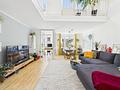 zur Kapitalanlage: Schöne Maisonette-Dachterrassenwohnung mit großem Ostbalkon in Taufkirchen - Wohnbereich 